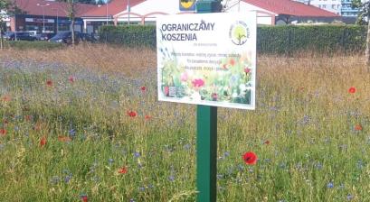 Tabliczka z informacją o ograniczeniu koszenia 