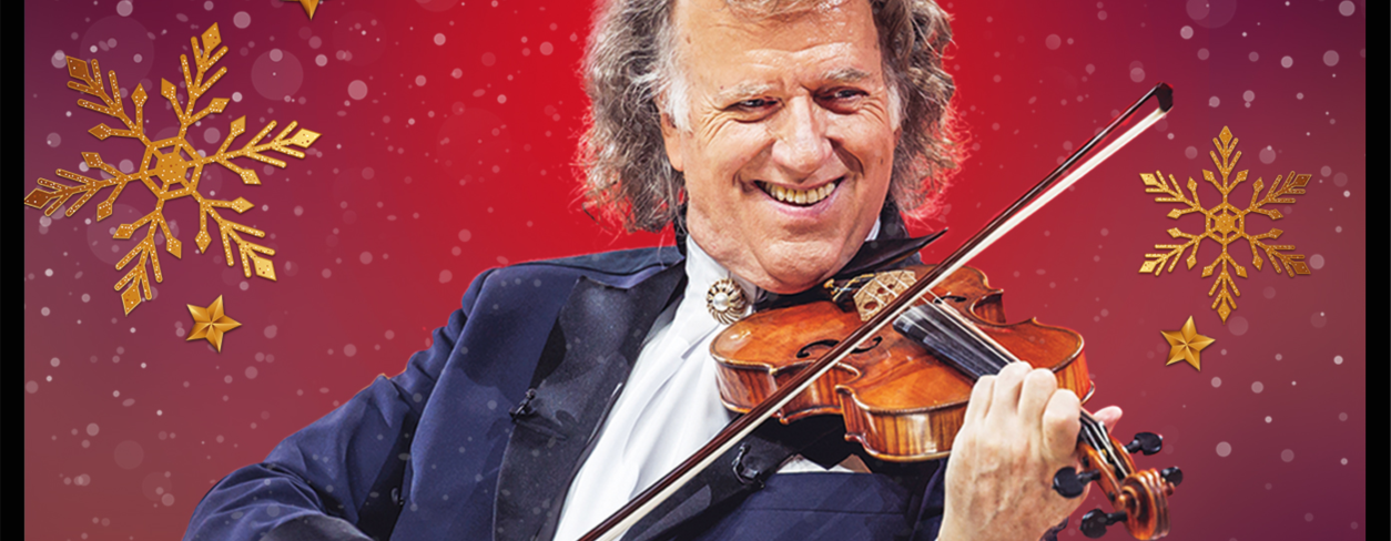 Na plakacie Andre Rieu na świątecznym tle