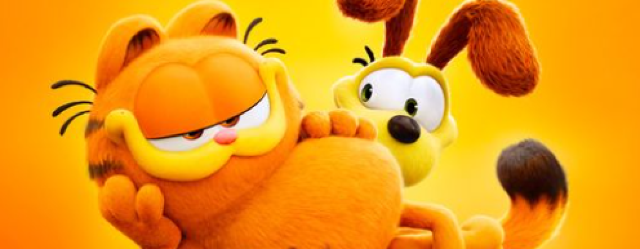 Plakat filmu GARFIELD. Kot Garfield leży na ziemi, za nim stoi pies.