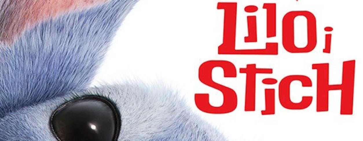 Stich wychylający się z boku, puchaty liliowy stworek 