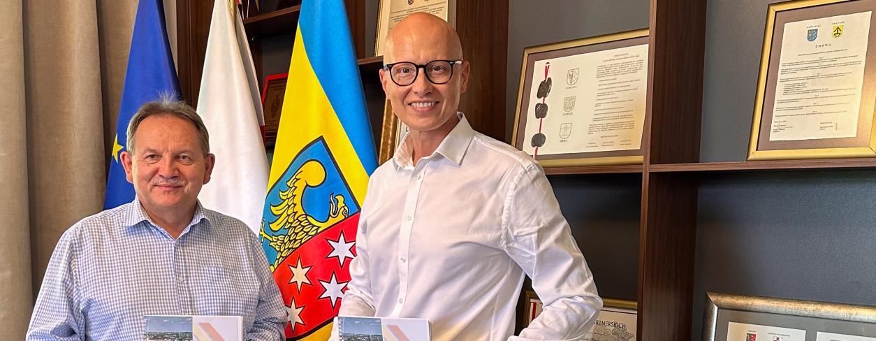 BURMISTRZ  I PRZEWODNICZĄCY RADY MIEJSKIEJ Z RAPORTEM